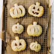 Adorable jack-o-lantern shaped Pumpkin Hand Pies are the perfect treat to celebrate the season. Made with the easiest pastry crust ever!