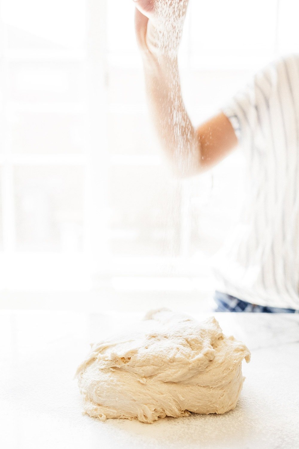 Kneading dough in outlet mixer