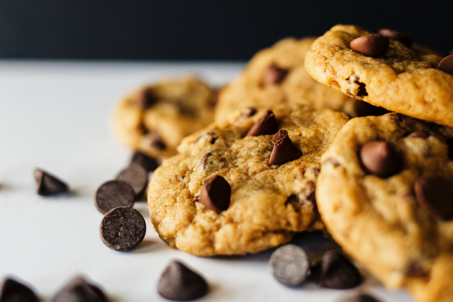 Chewy, soft Pumpkin Chocolate Chip Cookies on a plate