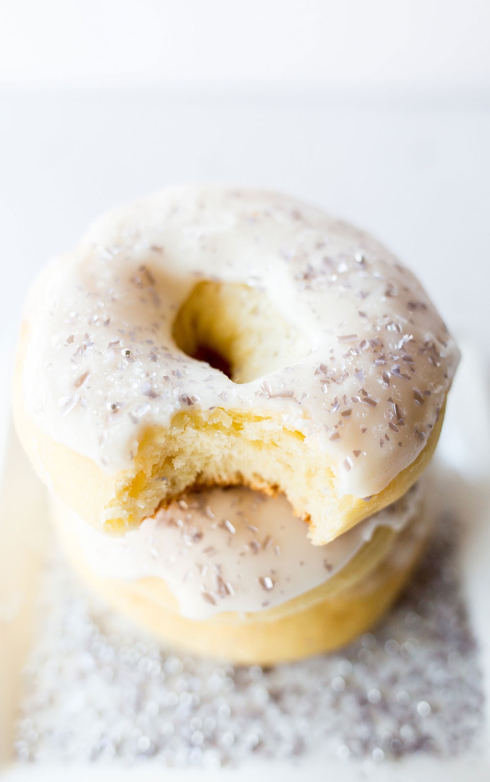Baked, not fried, these yeast raised Champagne Doughnuts are perfect for any New Years party or even any bridal celebration!