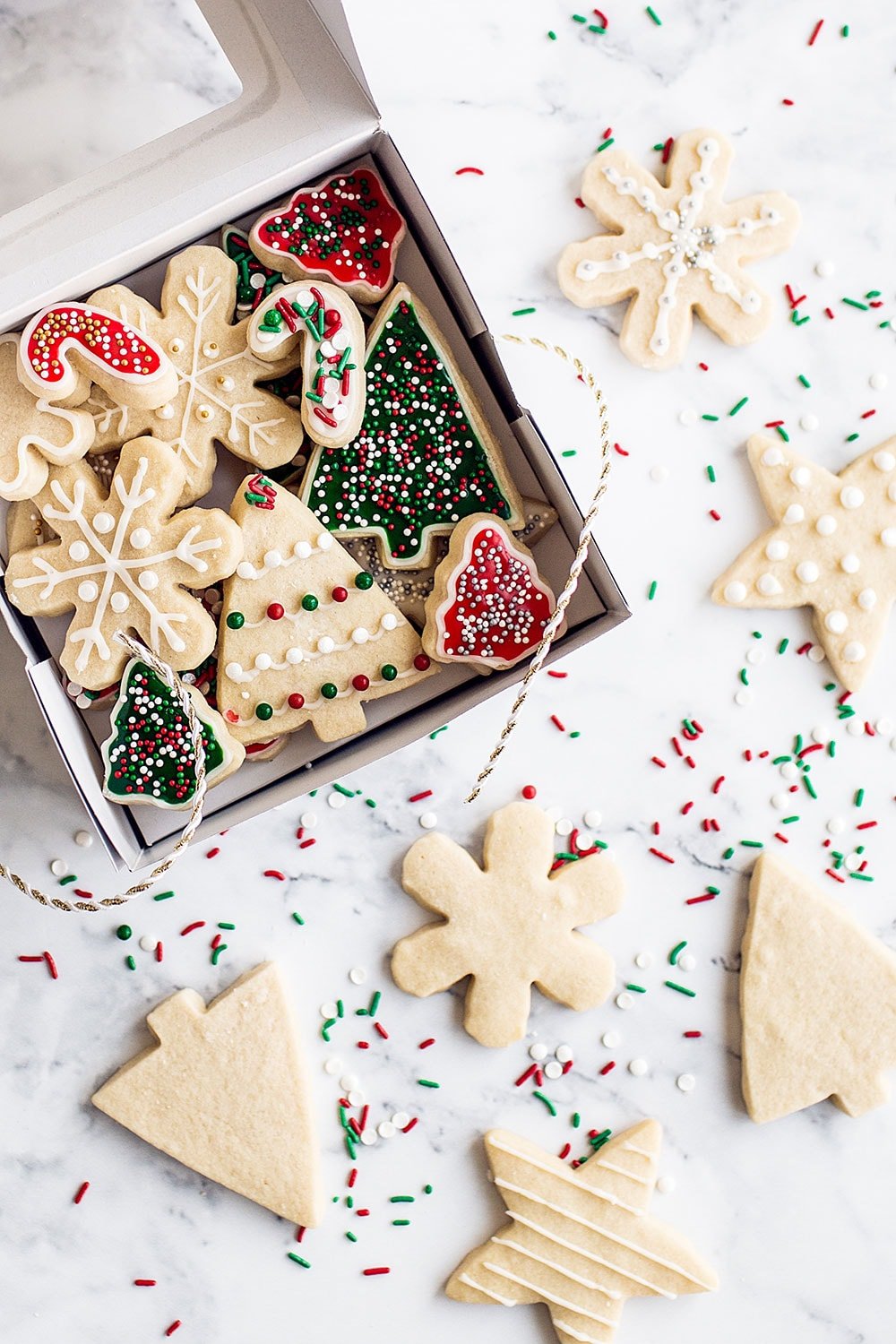 Easy Cut Out Sugar Cookies with Icing features a simple dough that's fun to work with so you can make any festive shaped and decorated cookies you want!