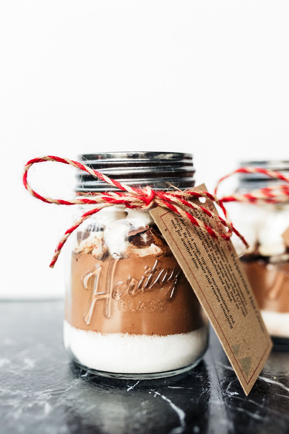My recipe for homemade Peppermint Hot Cocoa is super easy yet flavorful and can be made into adorable DIY edible gifts. Printable recipe cards and gift tags included!