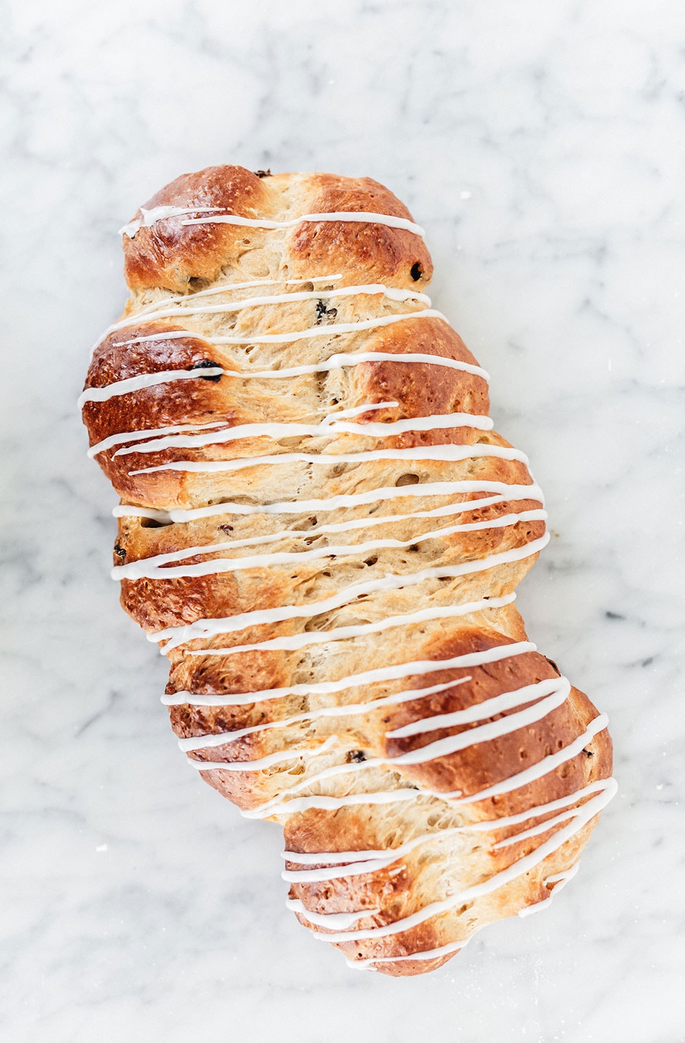 This Rum Raisin Bread is beautifully braided and loaded with comforting flavors, making it perfect for the holiday season. A super impressive recipe, but surprisingly achievable! 