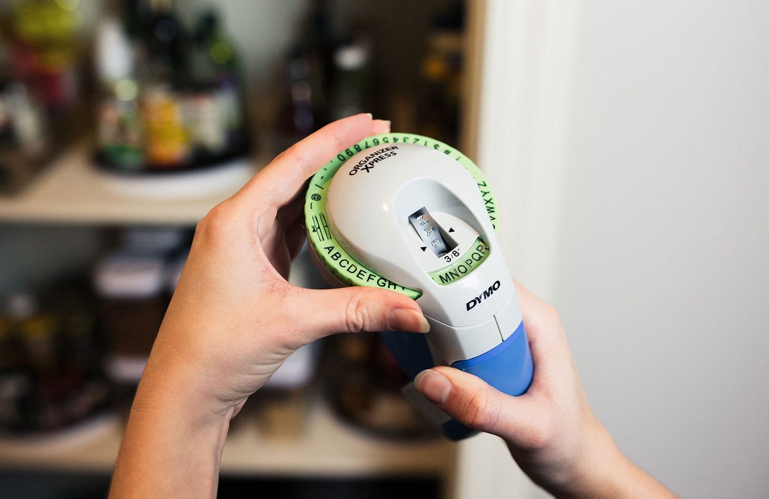 Embossed label maker for pantry organization