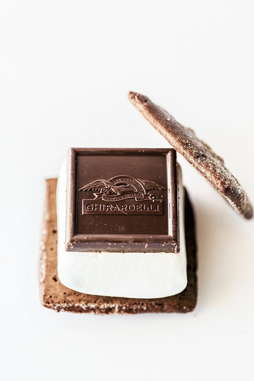 Take s'mores to a whole new level with homemade chocolate graham crackers and Ghirardelli SQUARES!