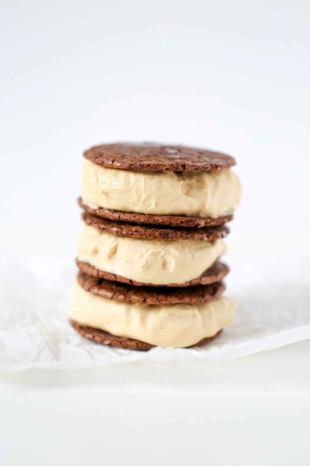 Coffee Brownie Ice Cream Sandwiches feature two layers of thin but ultra rich and fudgy brownie cookies sandwiching a generous layer of creamy cold brew coffee ice cream.