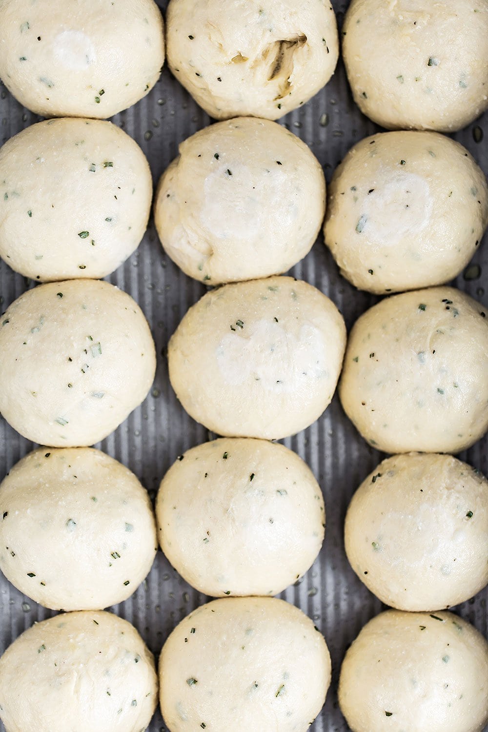Ricotta Herb Bread Rolls are amazingly soft, tender, and pillowy in texture with tons of rich and earthy flavors. These are bound to become a family favorite!
