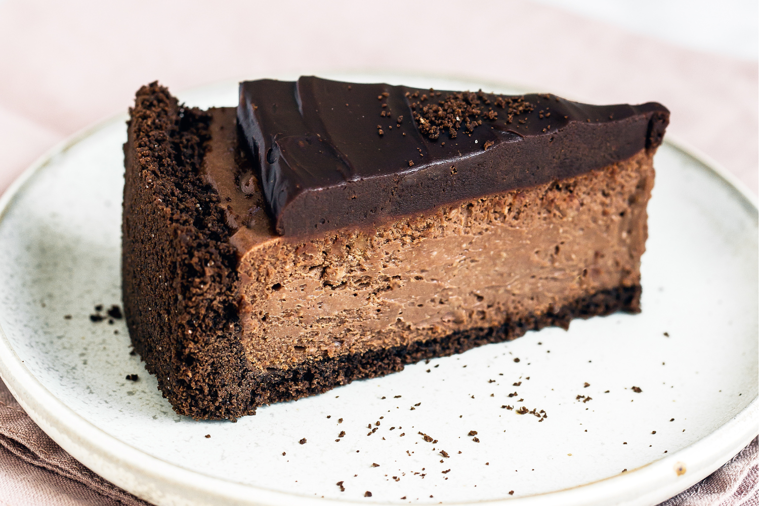 a closeup of a slice of death by chocolate cheesecake