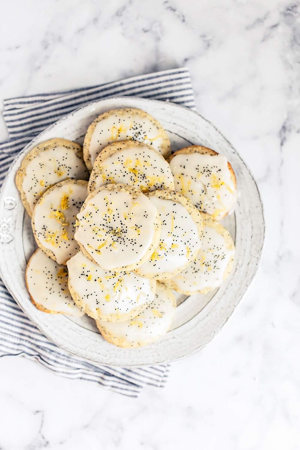 Beautifully bright and refreshing, these Soft Batch Lemon Poppy Seed Cookies are crazy tender and loaded with fresh lemon flavor. Perfect summer cookie!