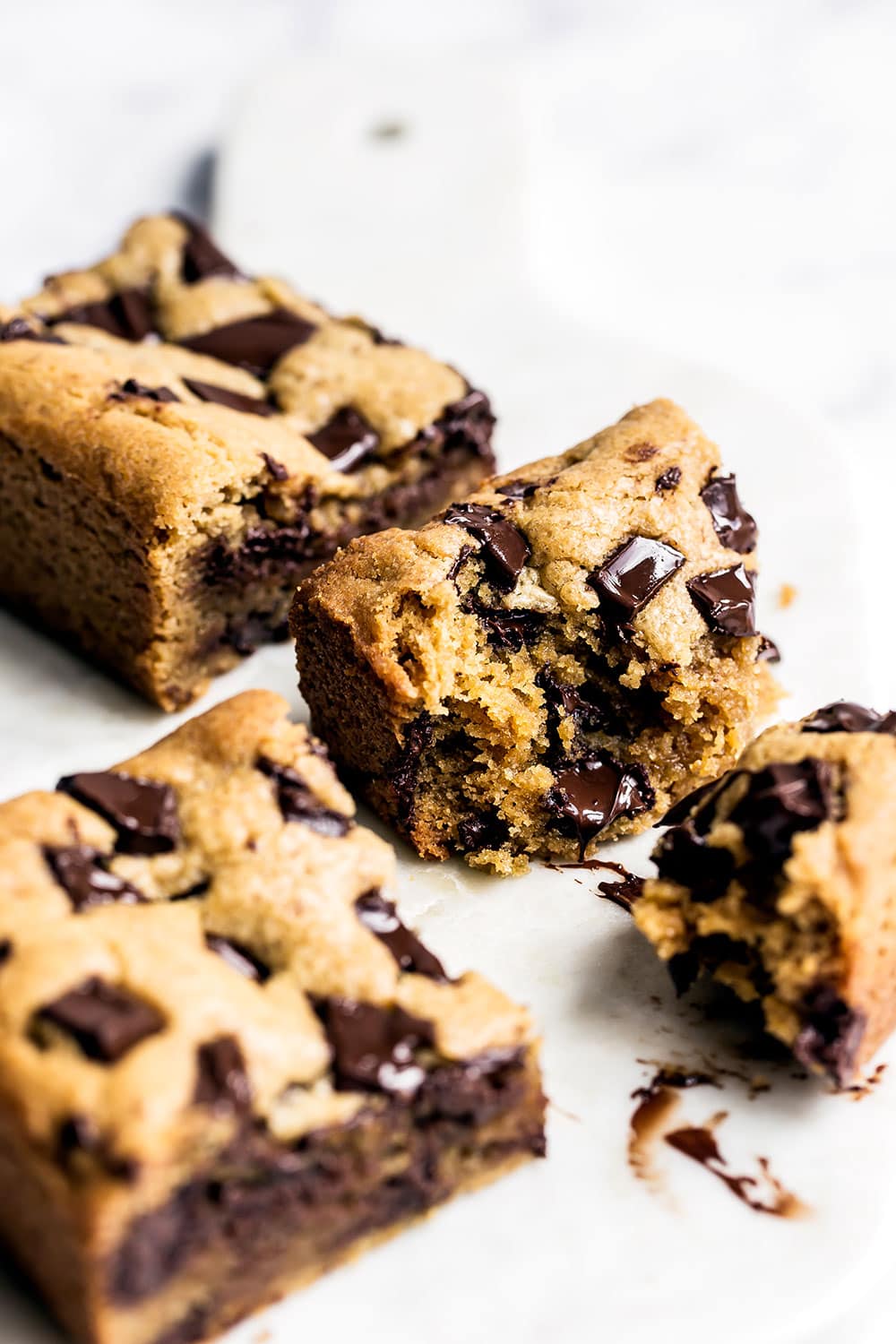 Super thick and chewy peanut butter chocolate chunk cookie bars