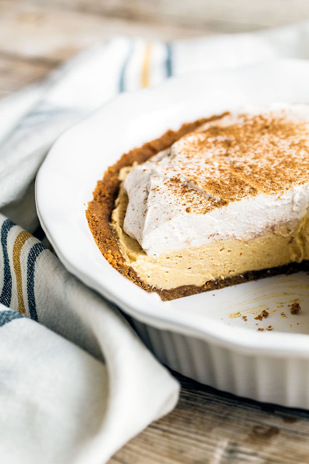 Easy no bake pumpkin mousse pie with Biscoff cookie crust is the perfect Thanksgiving dessert!