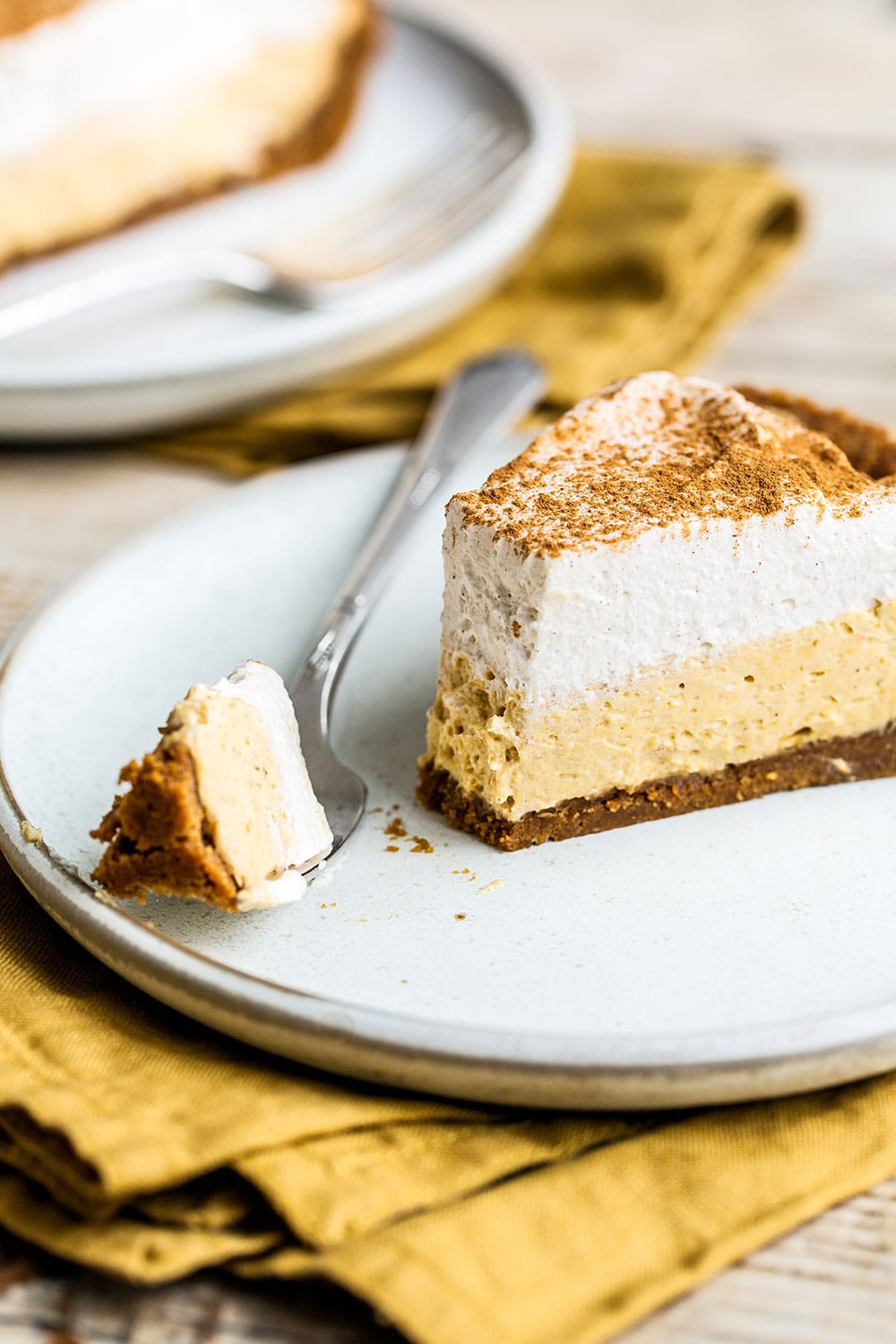 Easy no bake pumpkin mousse pie with Biscoff cookie crust is the perfect Thanksgiving dessert!