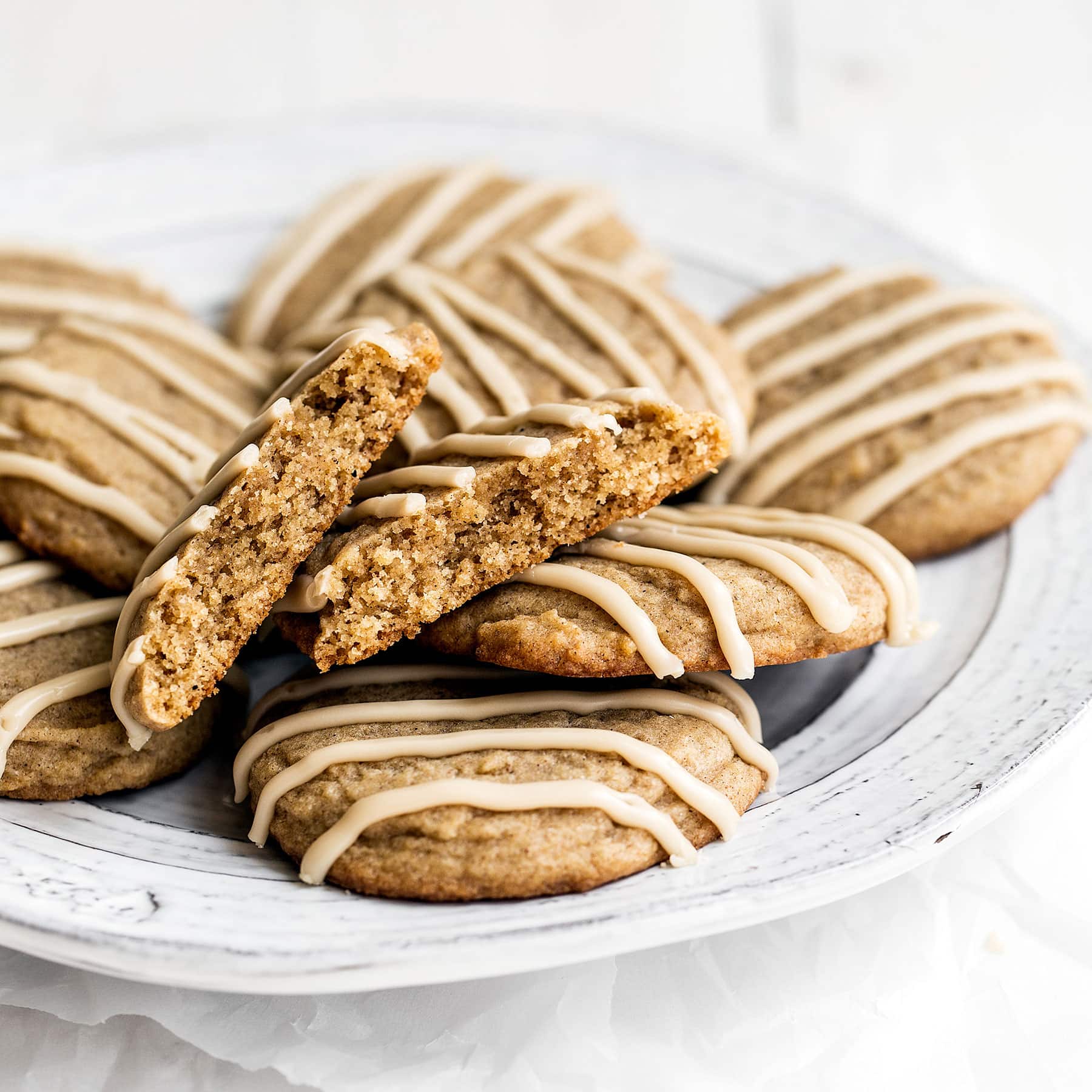 Easy Chai Sugar Cookies are thick, soft, loaded with sweet warm spices, and topped with a simple espresso glaze. Perfect 30 minute recipe for a cozy autumn day!