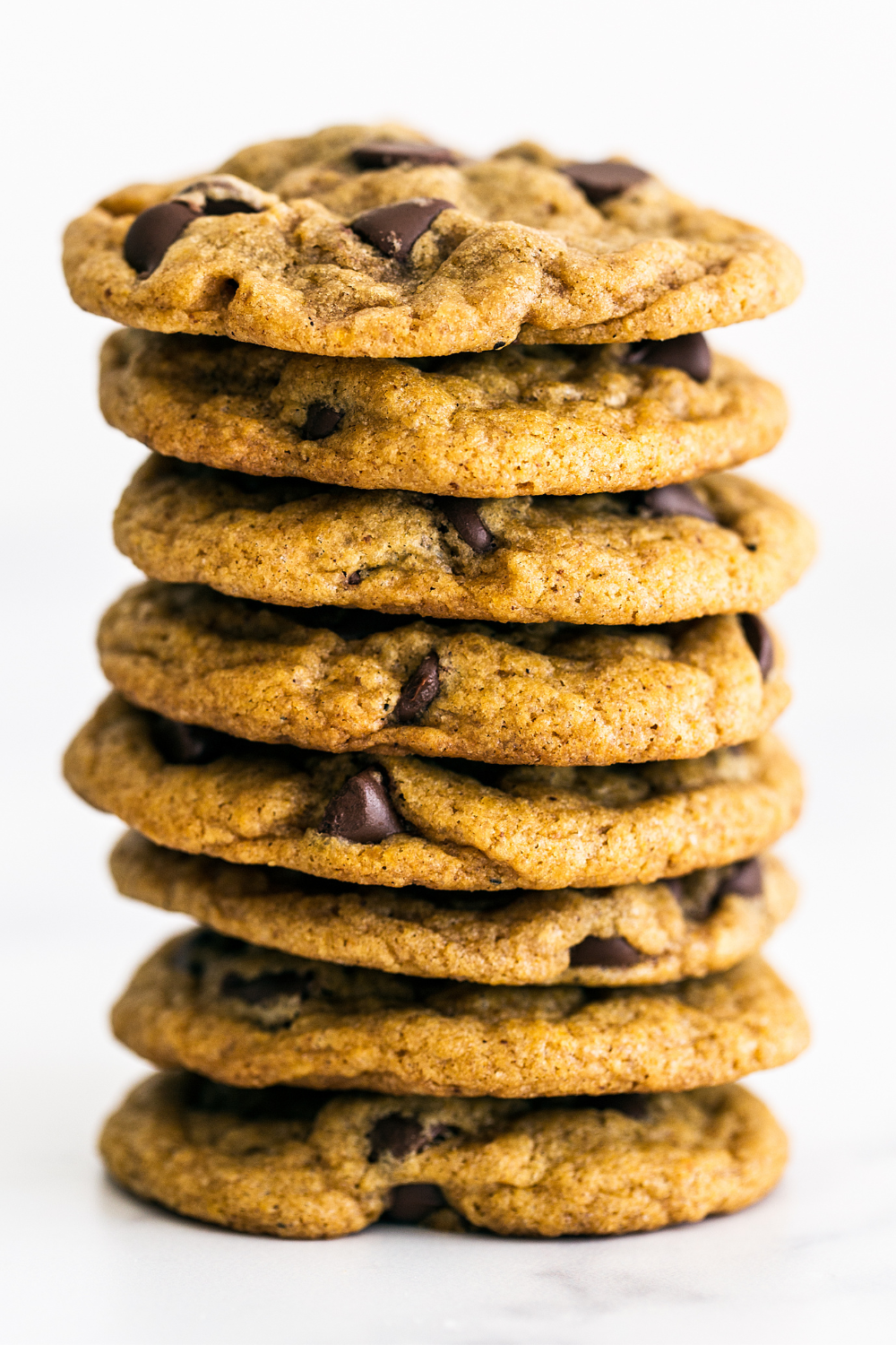 tall stack of thick, chewy pumpkin choc chip cookies!