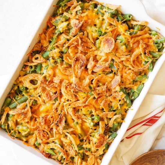 Overhead of cheesy green bean casserole with French's French fried onions on top