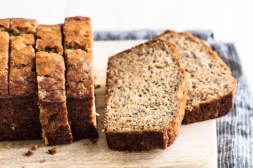 easy banana bread recipe is so moist as seen in the slices here