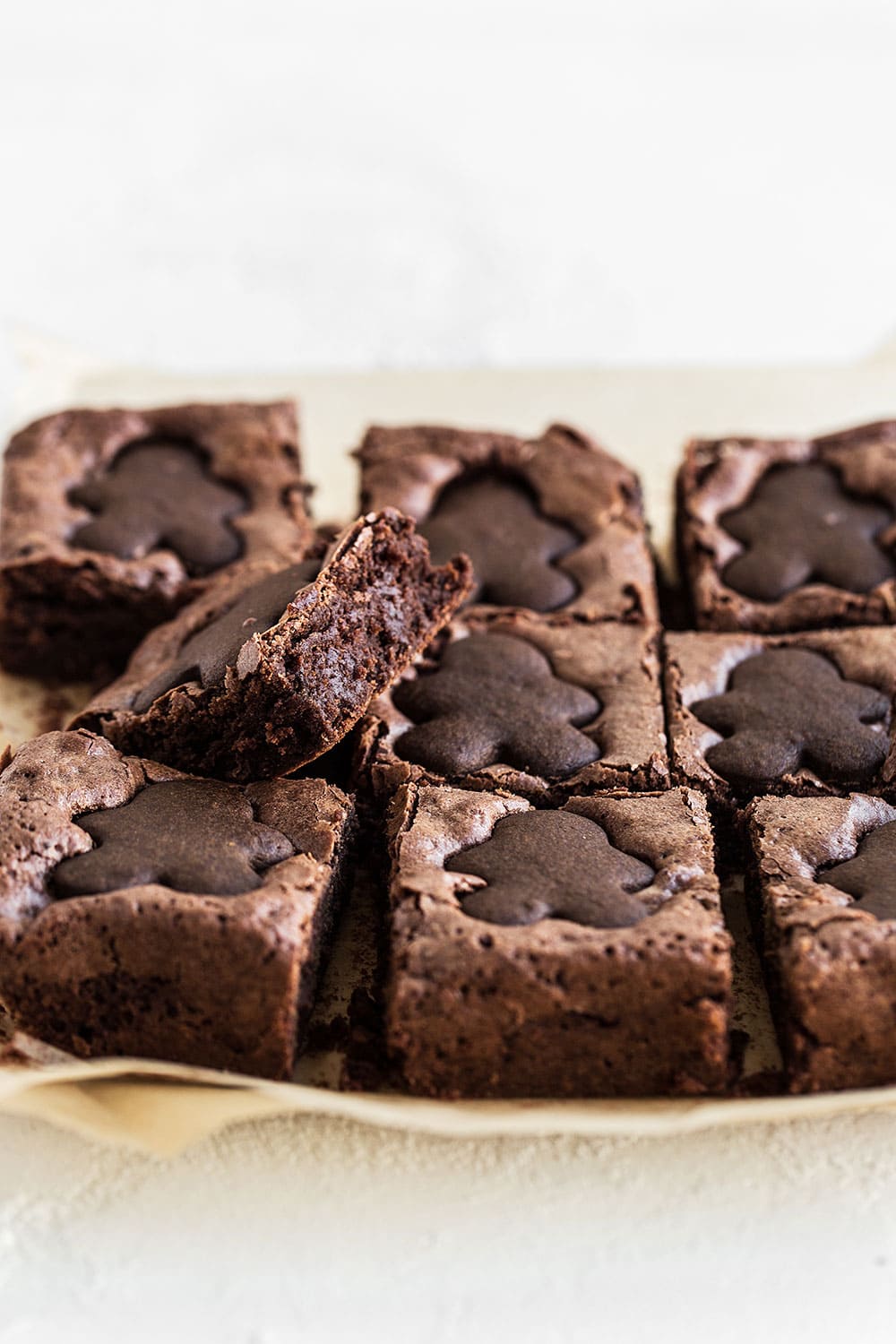 Spiced gingerbread brownies feature a fudgy brownie loaded with homemade gingerbread cookies