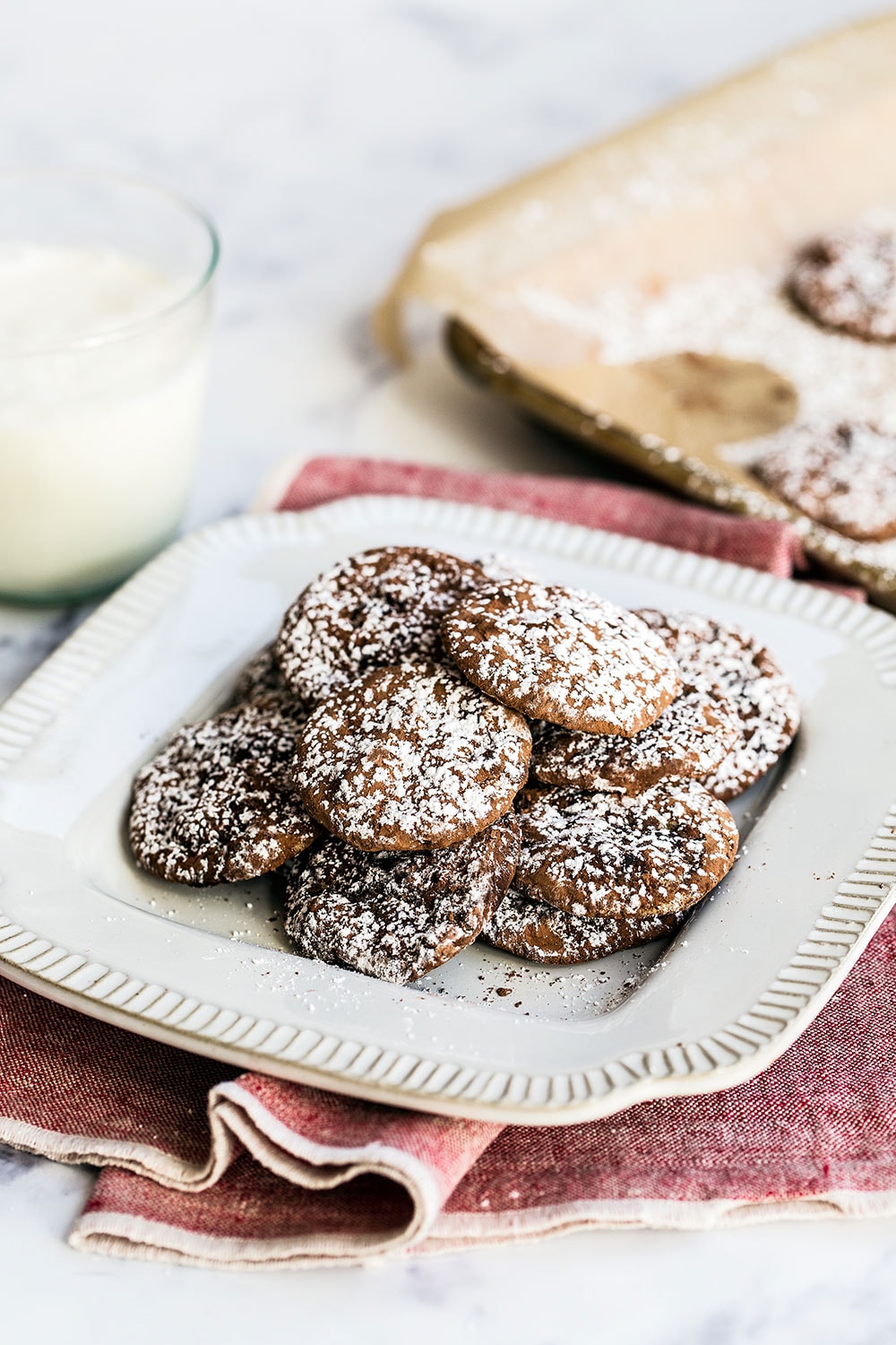 Mocha Cookies are bite-sized soft and chewy espresso chocolate chip cookies coated in cocoa powder and dusted with a snowfall of powdered sugar. A great Christmas cookie recipe!