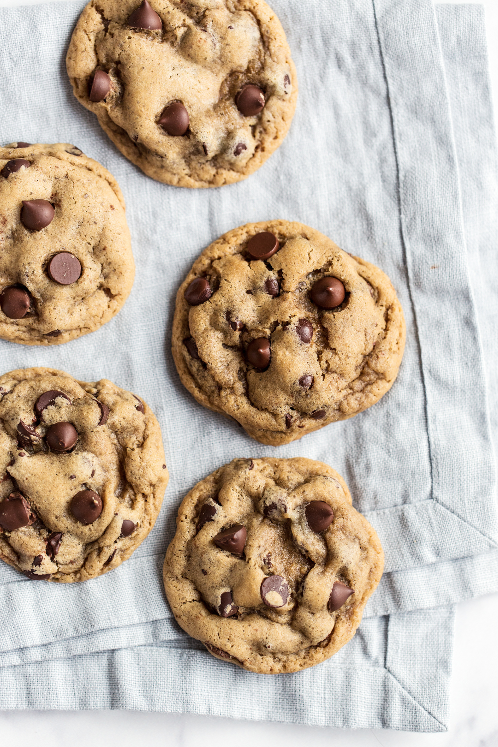 Soft Chocolate Chip Cookies on a light blue napkin
