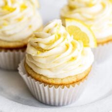 Plate of three lemon cupcakes