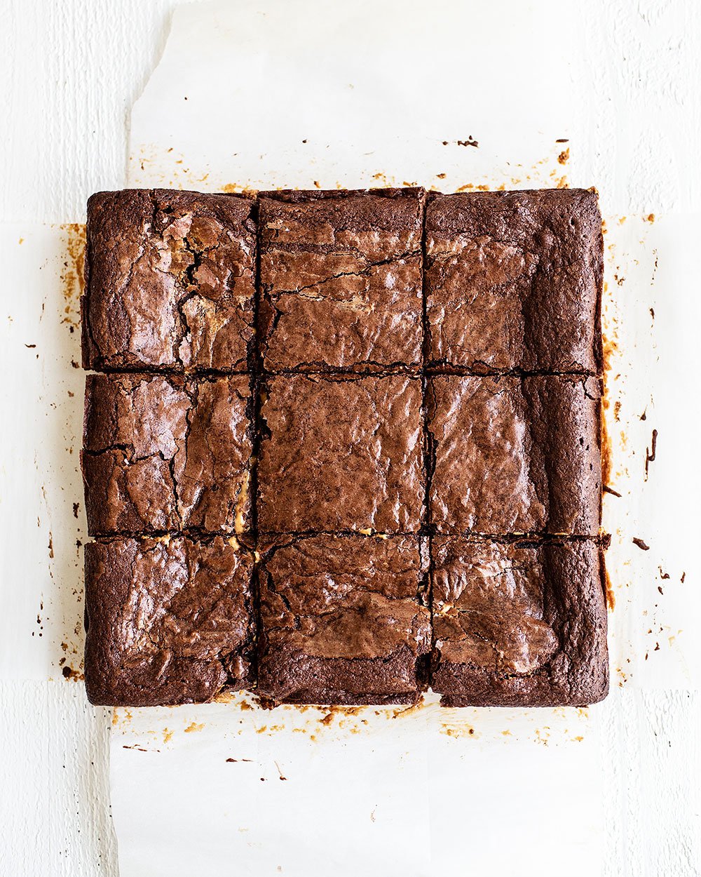 Peanut butter stuffed brownies cut into nine squares