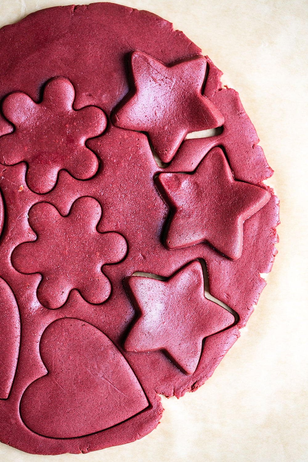 red velvet cookie dough and cookie cutter