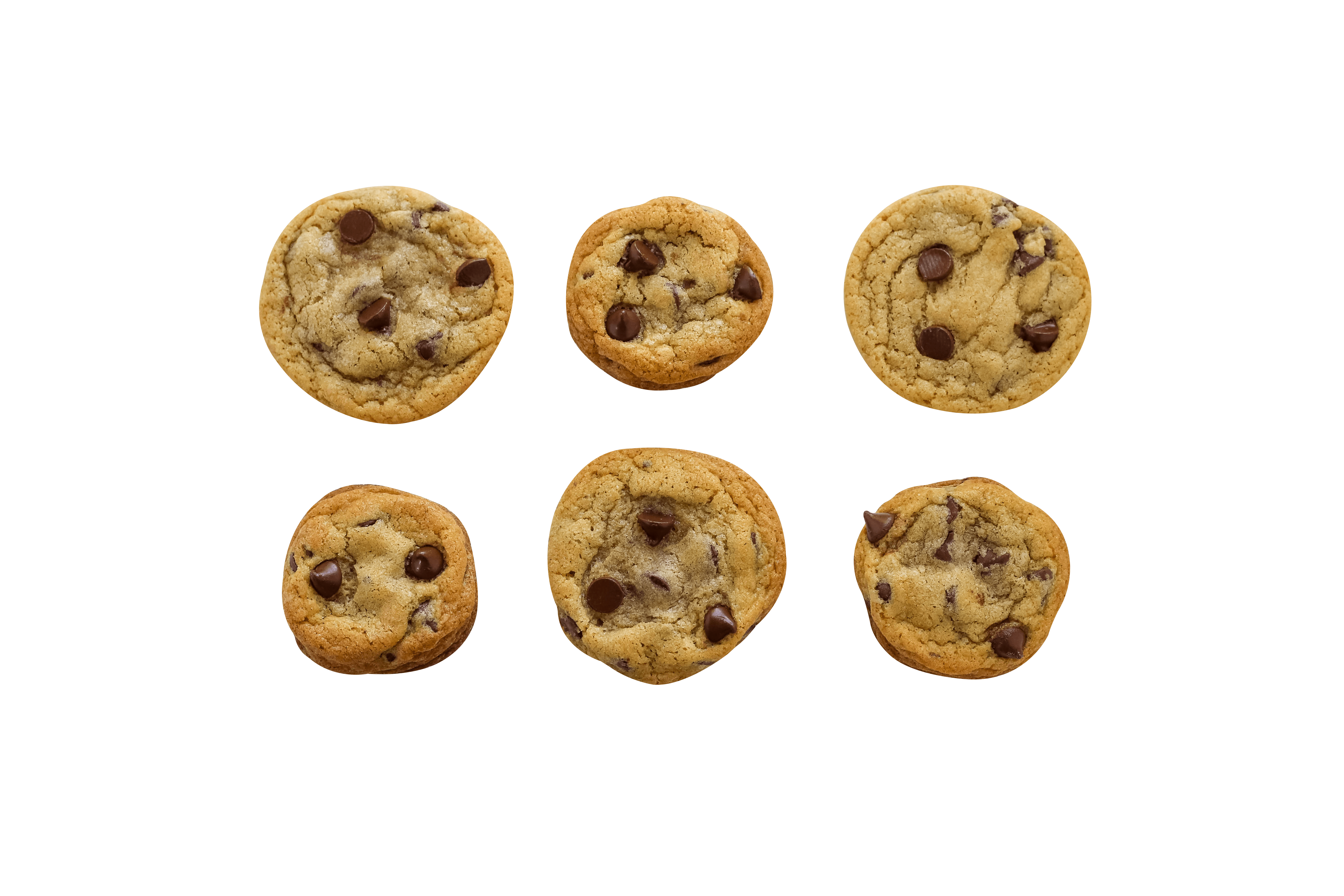 Six cookies baked on different baking sheets for comparison. 