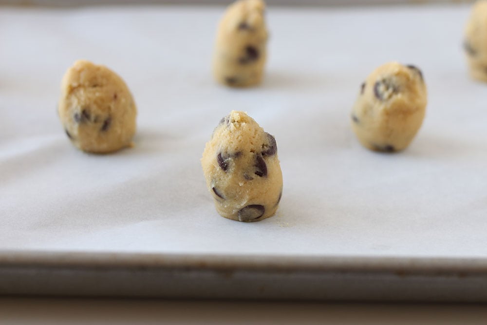 Cookie dough shaped into tall mounds instead of round disks.