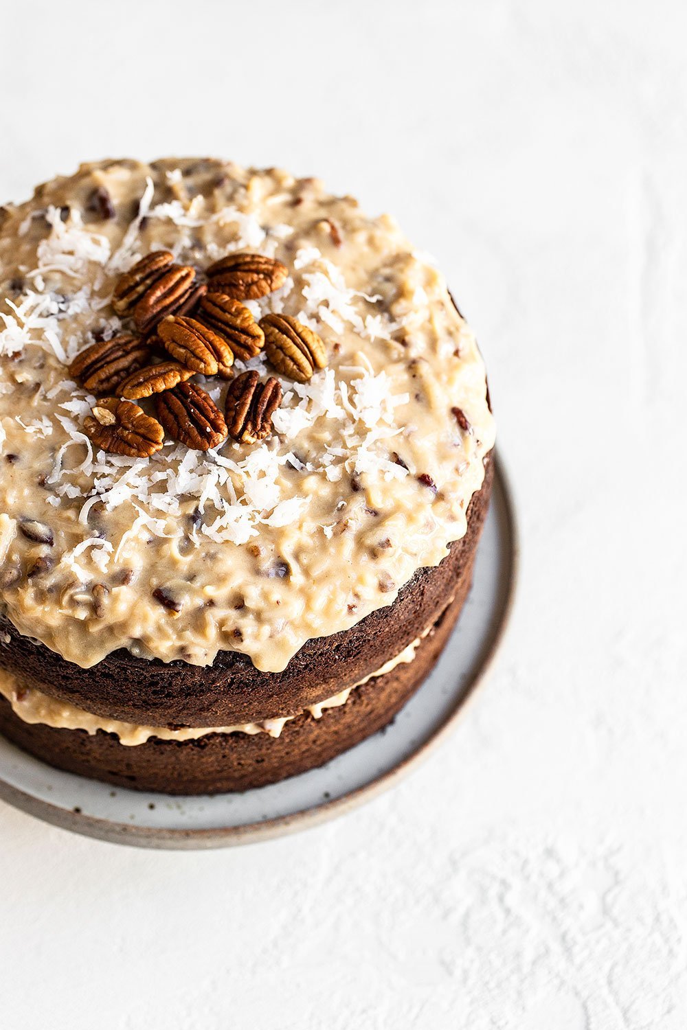 Chocolate Cake with Coconut Pecan Frosting on a plate