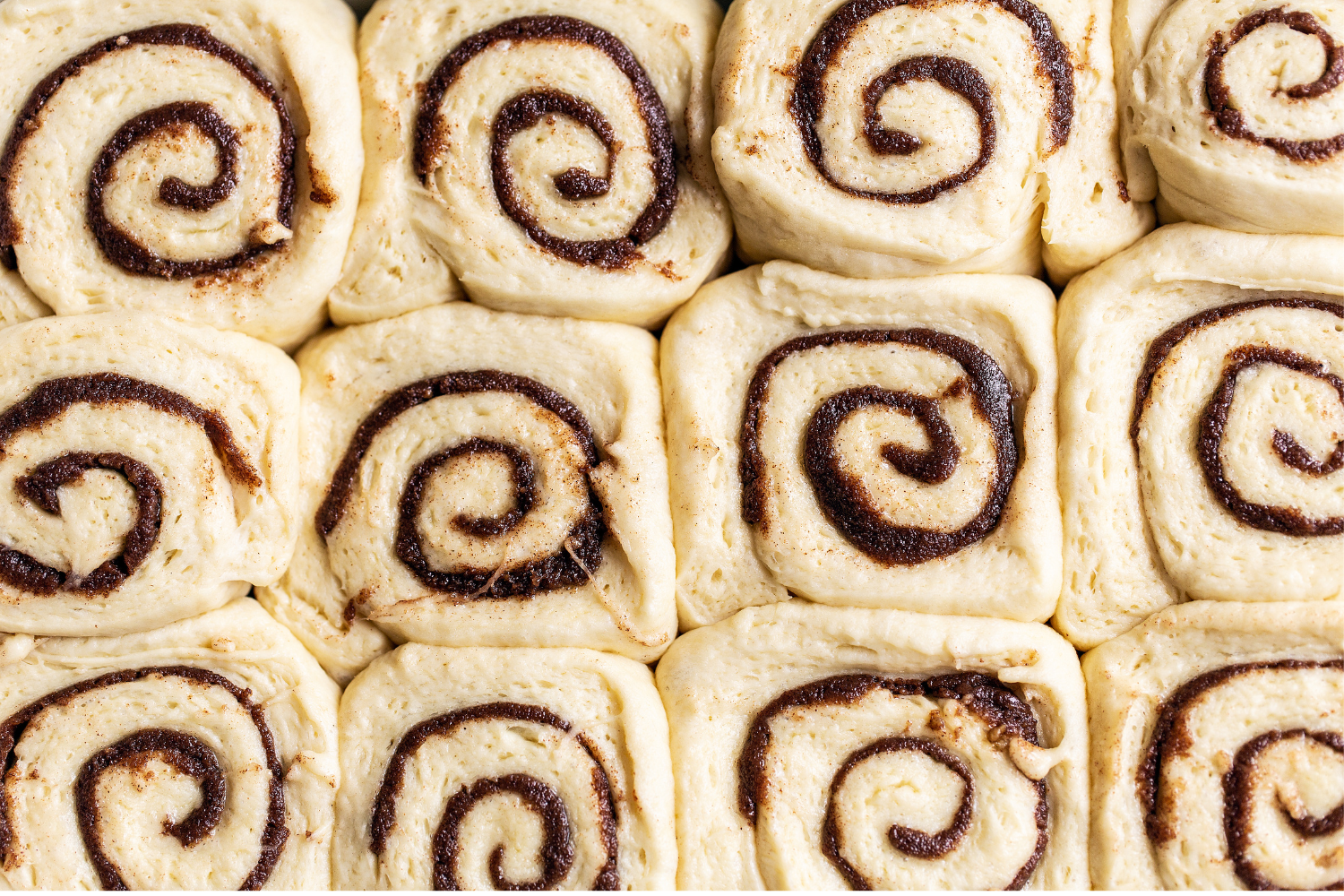 unbaked homemade cinnamon rolls, ready to be baked