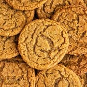 close up of several gingersnap cookies, showing how crisp and crinkly they are