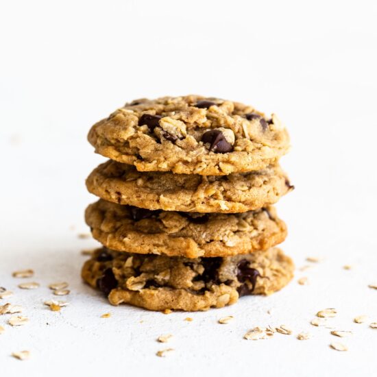 Stack of four peanut butter oatmeal chocolate chip cookies