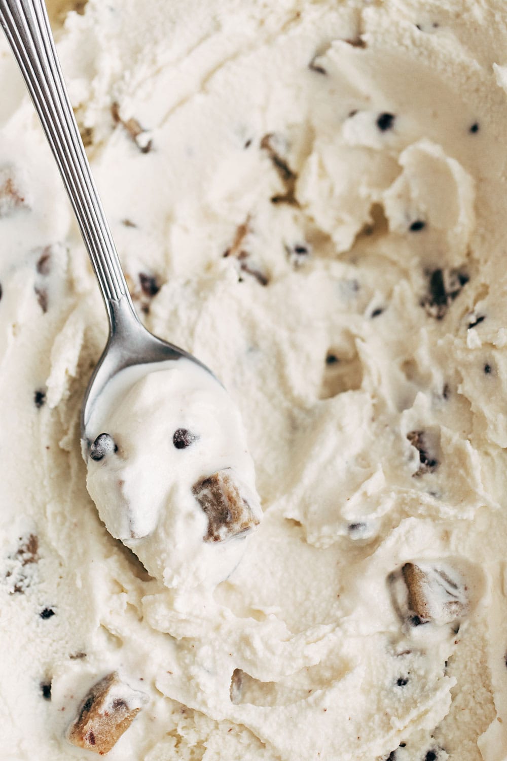 Rich and creamy chocolate chip cookie dough ice cream with spoon