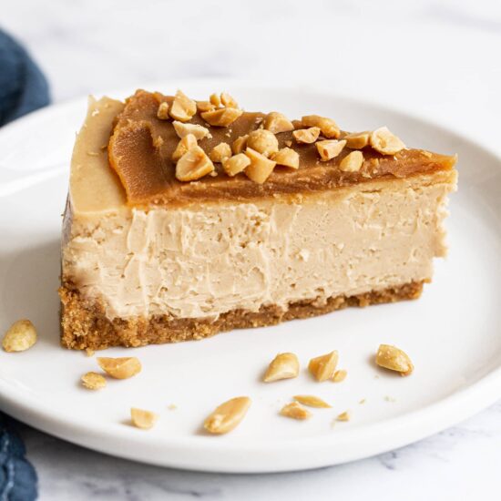 slice of homemade peanut butter cheesecake on a plate