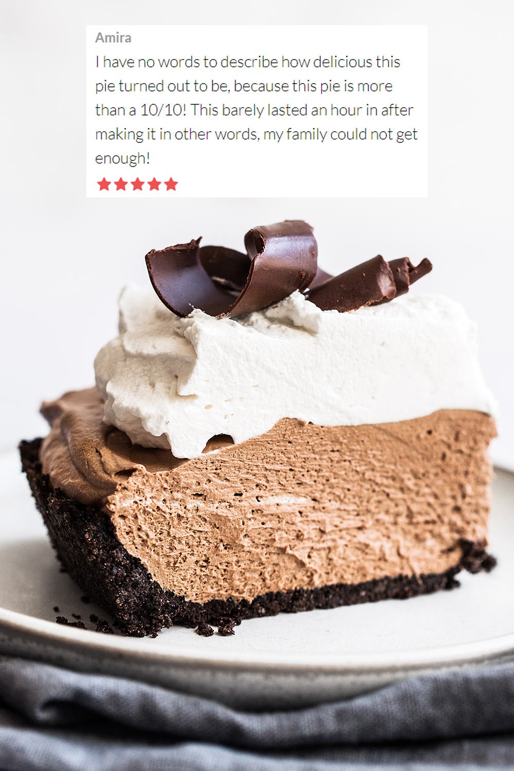 slice of french silk pie with homemade whipped cream and chocolate curls