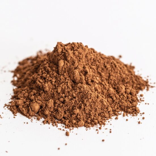 heaping pile of cocoa powder on a white surface