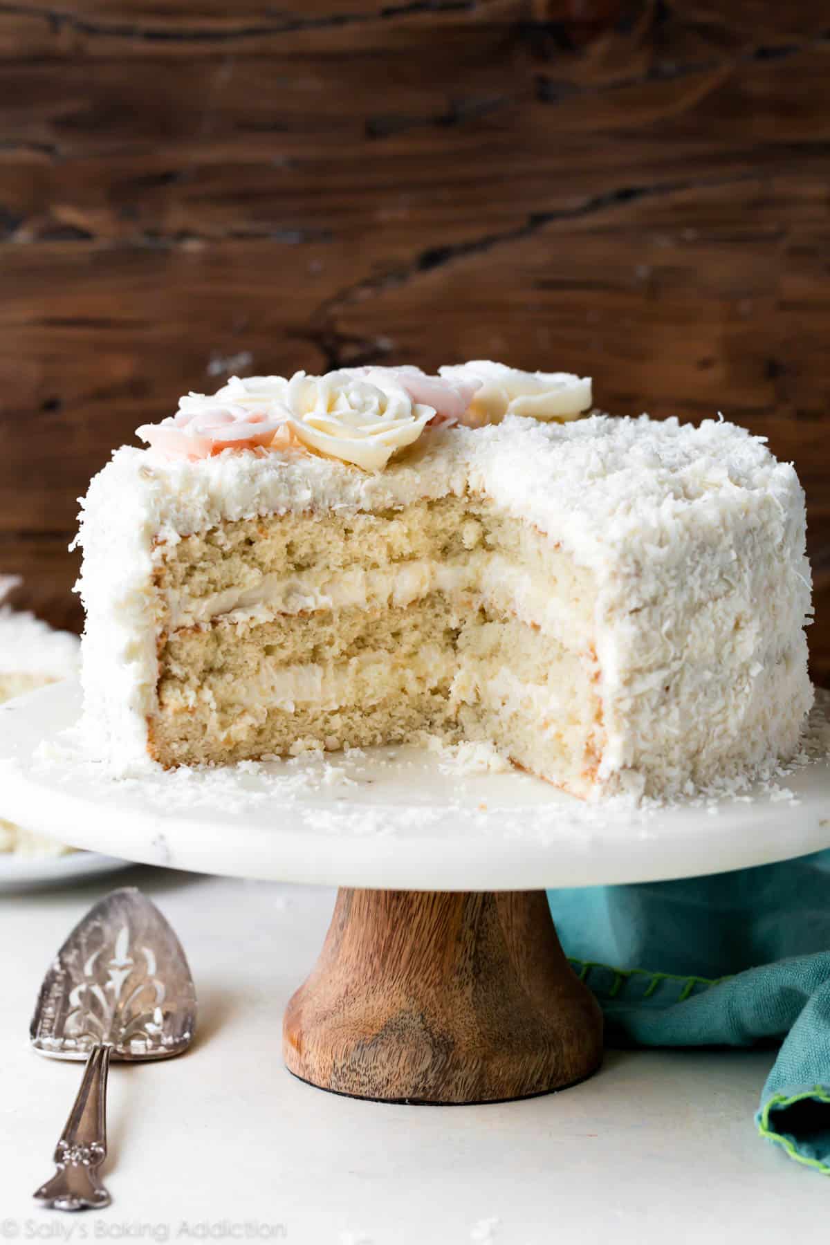 Sally’s Baking Addiction’s Coconut Cake with slices cut out