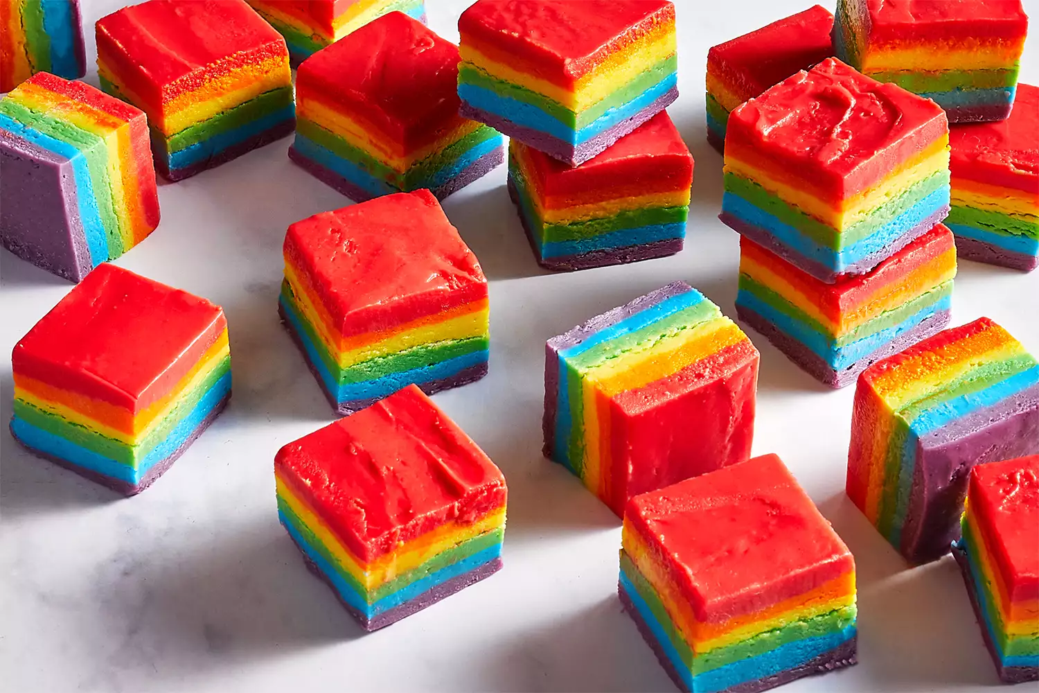 The Spruce Eats’ Rainbow White Chocolate Fudge - such a fun, colorful rainbow treat for St. Patrick's Day