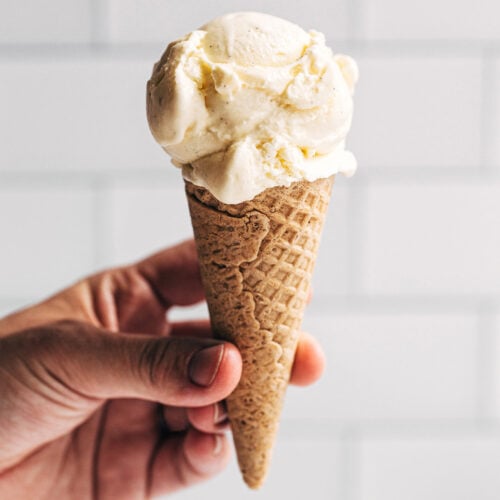 scoop of homemade french vanilla ice cream on a waffle cone