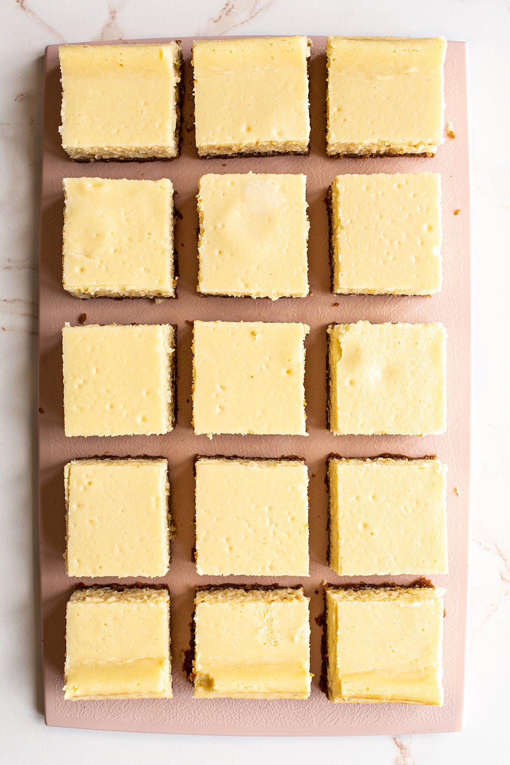 classic cheesecake bars cut into squares