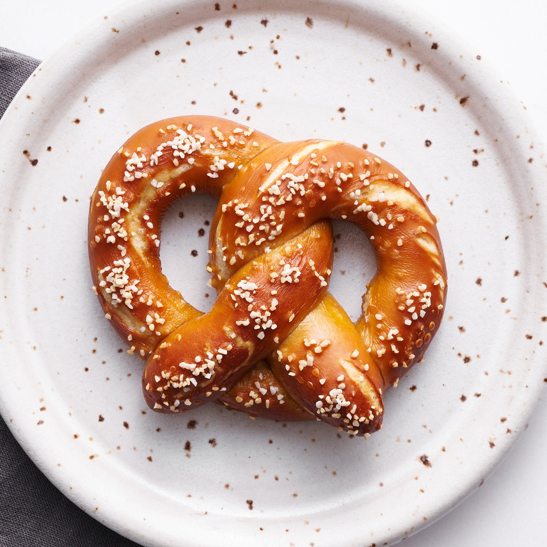 the most chewy traditional pretzel recipe on a marble surface