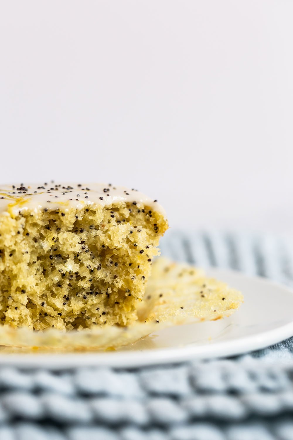 close up of the moist and tender lemon poppy seed muffin's texture
