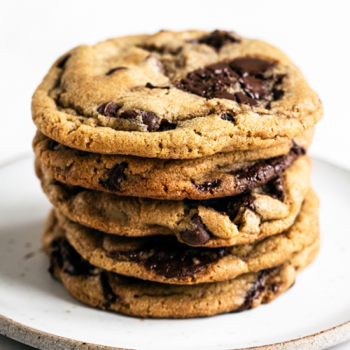 stack of five brown butter cookies on a plate