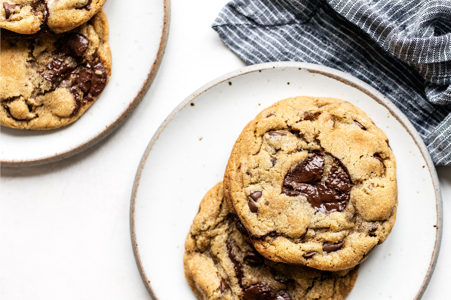 two Brown Butter Chocolate Chip Cookies on a plate