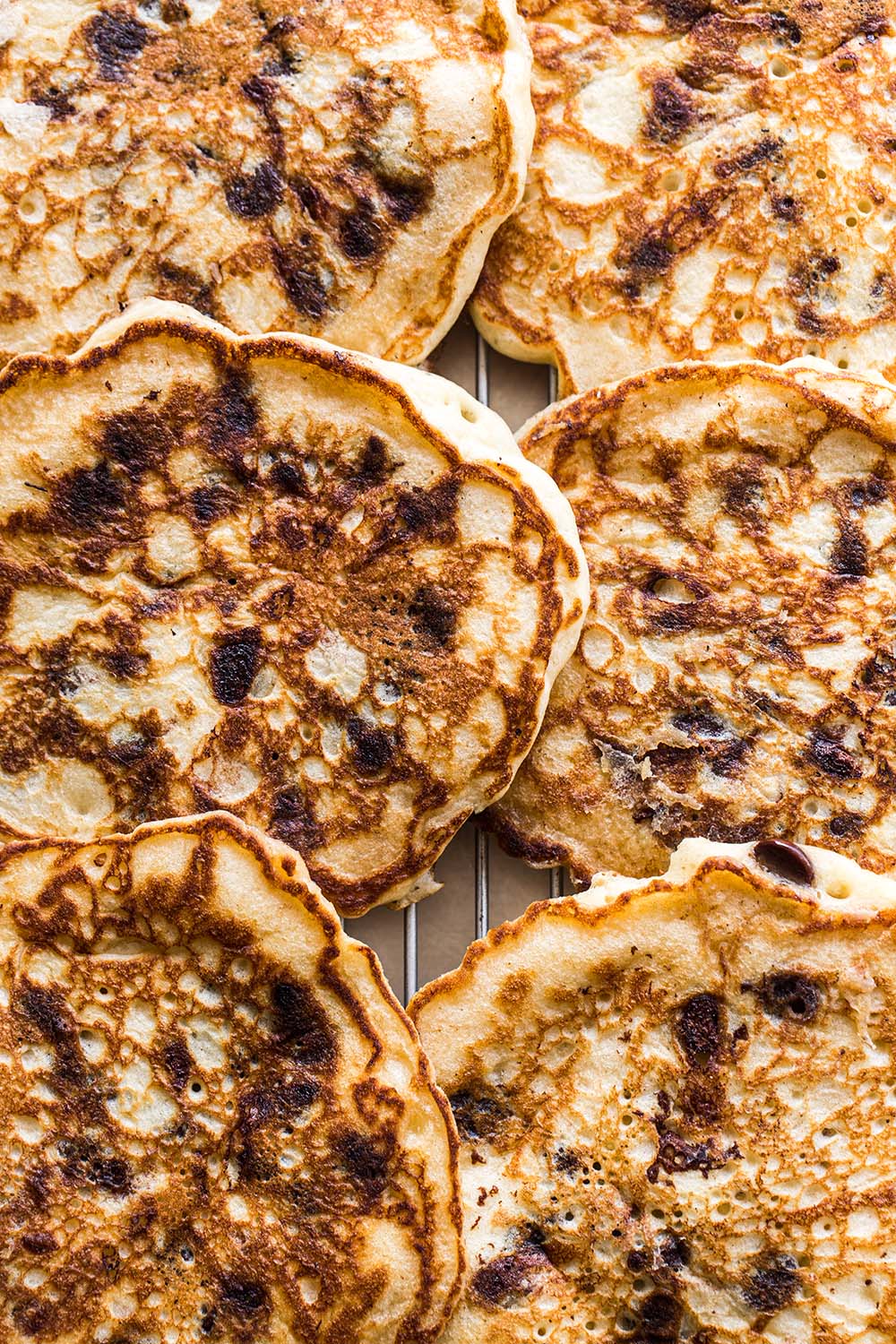 https://handletheheat.com/wp-content/uploads/2021/11/how-to-make-chocolate-chip-pancakes.jpg