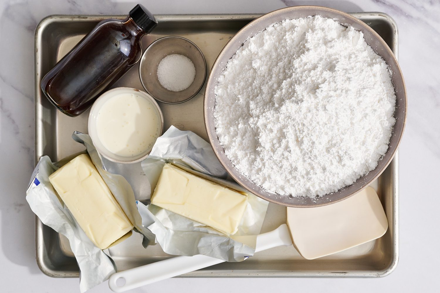 ingredients for best buttercream recipe on a baking pan