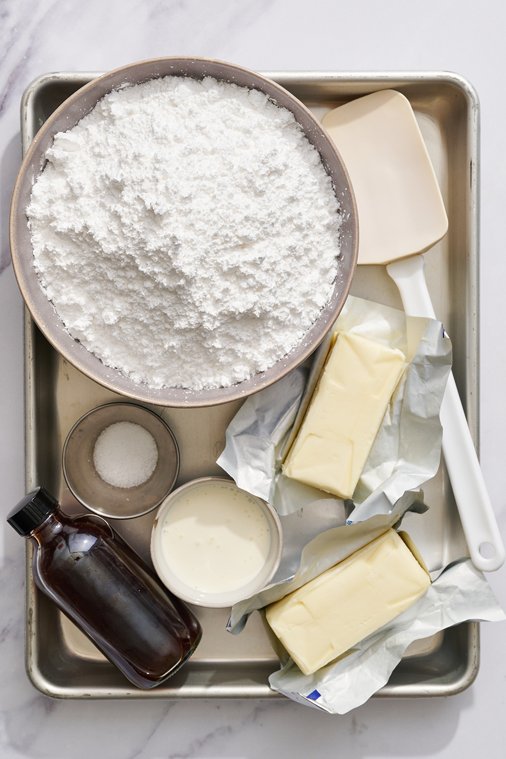 ingredients for best buttercream recipe on a baking pan