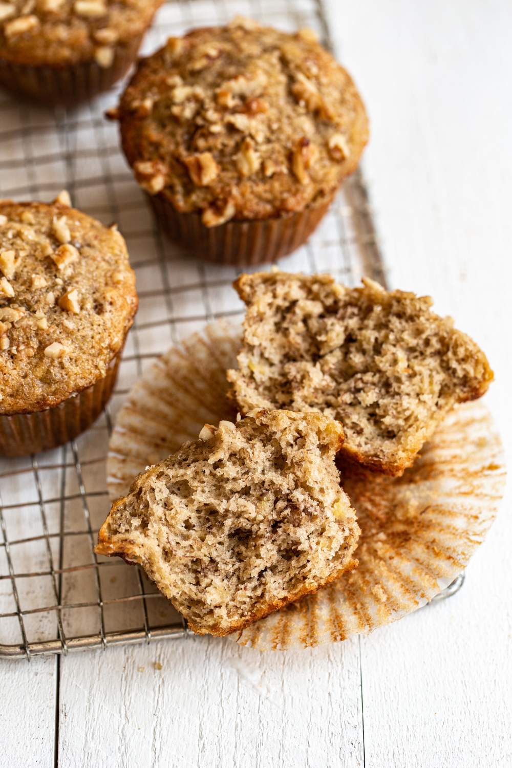banana nut muffin broken in half to see how moist it is