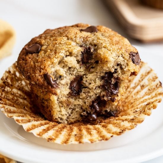homemade banana chocolate chip muffin with a bite taken out