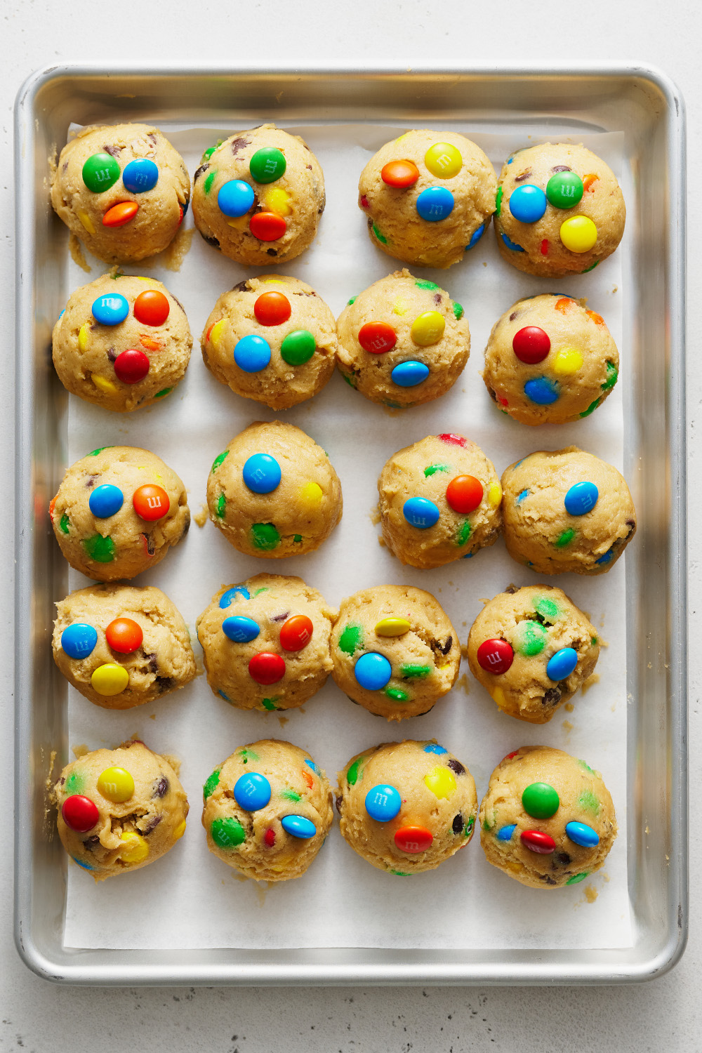 dough balls on a baking tray.